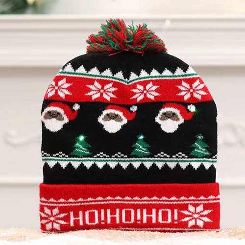 360 HOME CHRISTMAS HAT ELECTRIC BEANIE STYLE KNITTED MATERIAL BLACK BACKGROUND WHITE SANTA FACES"HOHOHO"ON BRIM+POMPOM