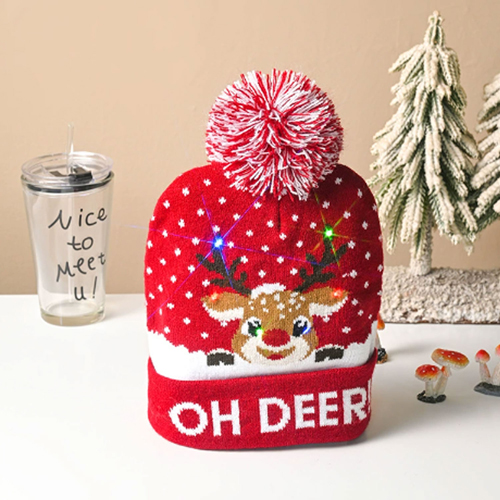 360 HOME CHRISTMAS HAT ELECTRIC BEANIE STYLE KNITTED MATERIAL RED BASE REINDEER FACE +ANTLERS&RED NOSE"OH DEER" ON BRIM+RED&WHITE POMPOM