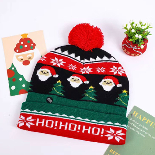 360 HOME CHRISTMAS HAT ELECTRIC BEANIE STYLE KNITTED MATERIAL MULTIPLE SANTA FACES+GREEN TREES "HOHOHO"+POMPOM